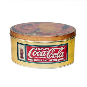 Coke | Coca Cola tin. Gibson Girl with wide-brim hat. Drink Coca-cola delicious and refreshing.