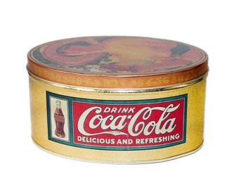 Coke | Coca Cola tin. Gibson Girl with wide-brim hat. Drink Coca-cola delicious and refreshing.