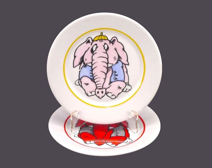 Pair of children's elephant plates. One pink elephant, one red elephant. Hand painted in Estonia by Laangoo.