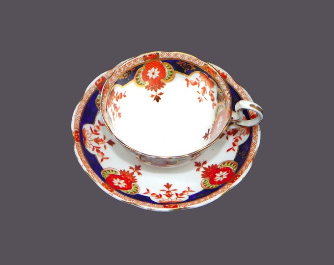 Antique Royal Albert Crown China 5294 hand-decorated cup and saucer set. Bone china made in England.
