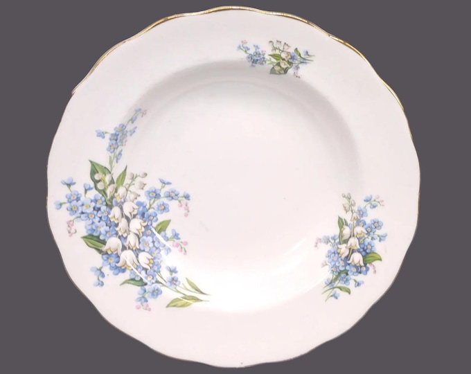 Colclough Forget-Me-Not rimmed soup bowl. Bone china made in England. Sold individually.
