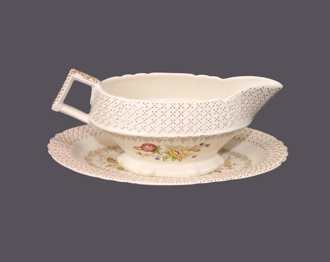 Myott Swing Time gravy boat with under-plate made in England. Flaw (see below).