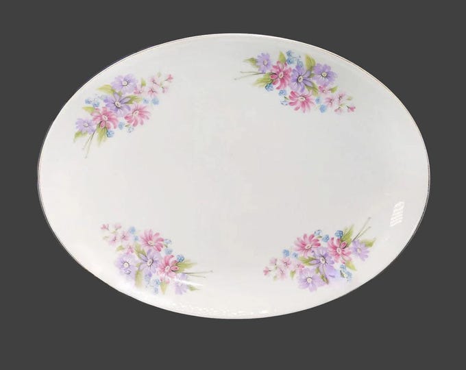 Leuco Fine China oval platter made in Japan. Pink, purple, blue florals. Flaw (see below).