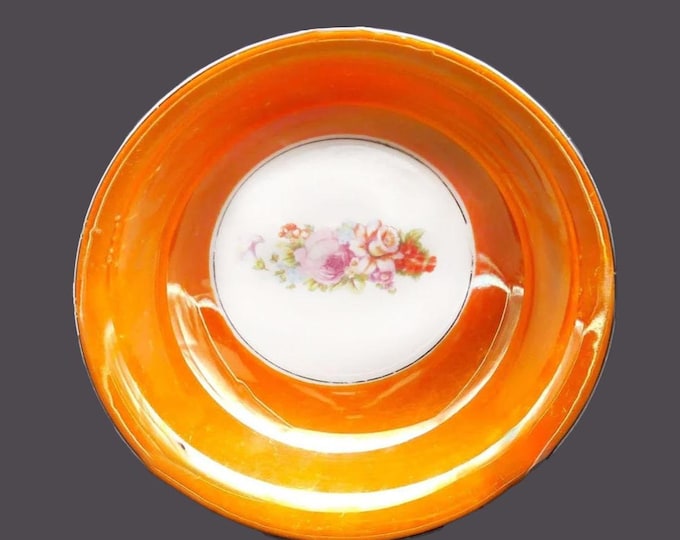 Hand-painted Nippon round serving bowl. Orange lusterware, central florals.