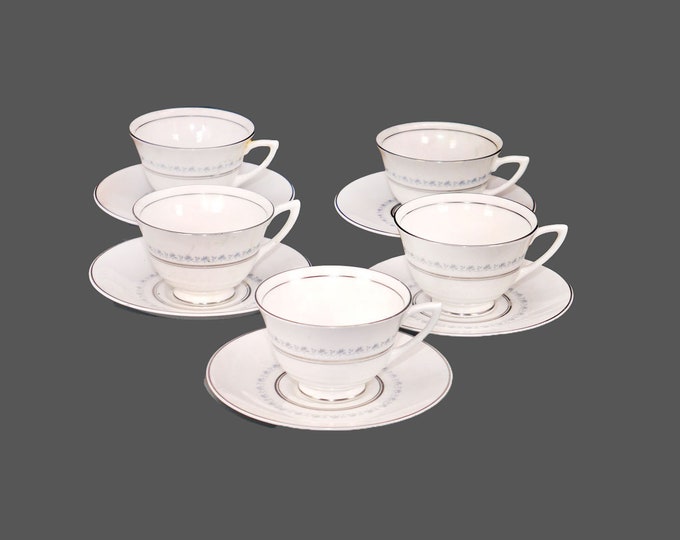 Five Royal Doulton Tiara H4915 bone china cup and saucer sets made in England.