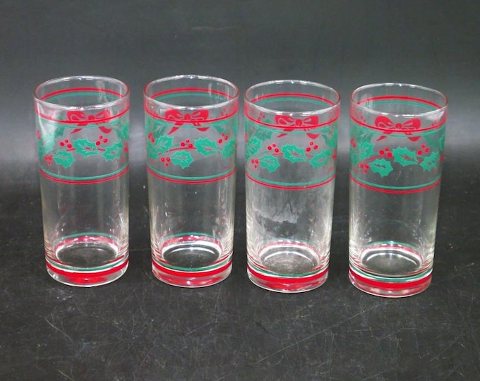 Four Anchor Hocking Christmas tumbler glasses. Etched-glass holly, red bows and berries made in USA.