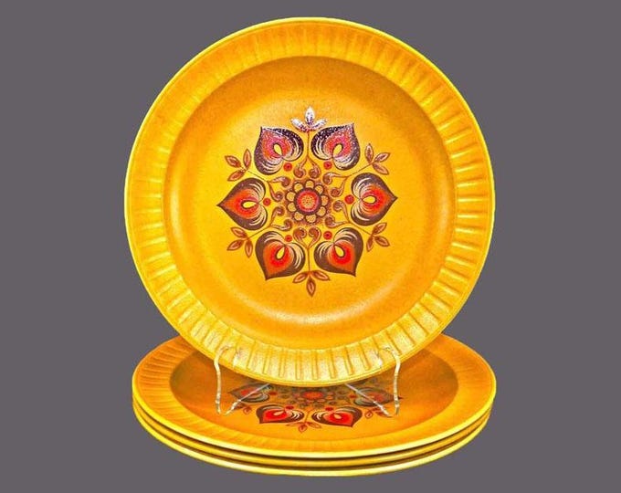 Four Herbert Aynsley Dragon Gold stoneware dinner plates. Brown floral medallion center made in England.