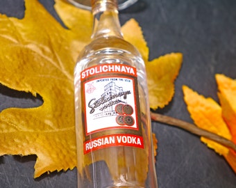 Stolichnaya Russian Vodka stemmed 4cl single shooter | shot glass. Etched-glass branding.