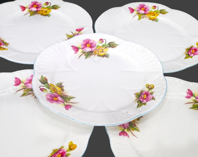 Six Shelley Begonia salad plates in the dainty shape. Bone china made in England. Flaws (see below).
