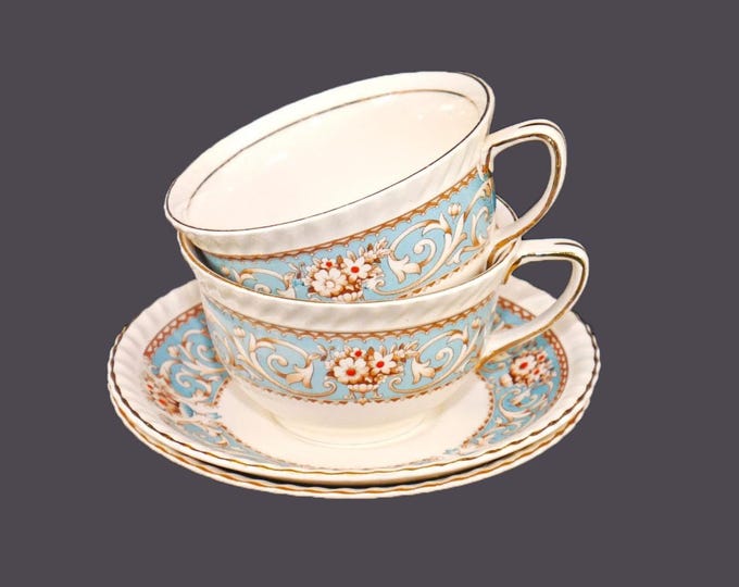 Pair of antique Johnson Brothers Hampton cup and saucer sets made in England.