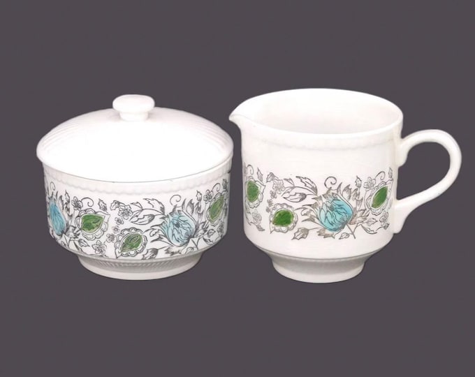 Retro Biltons creamer and covered sugar bowl. Teal green and black leaves on white. Made in England.
