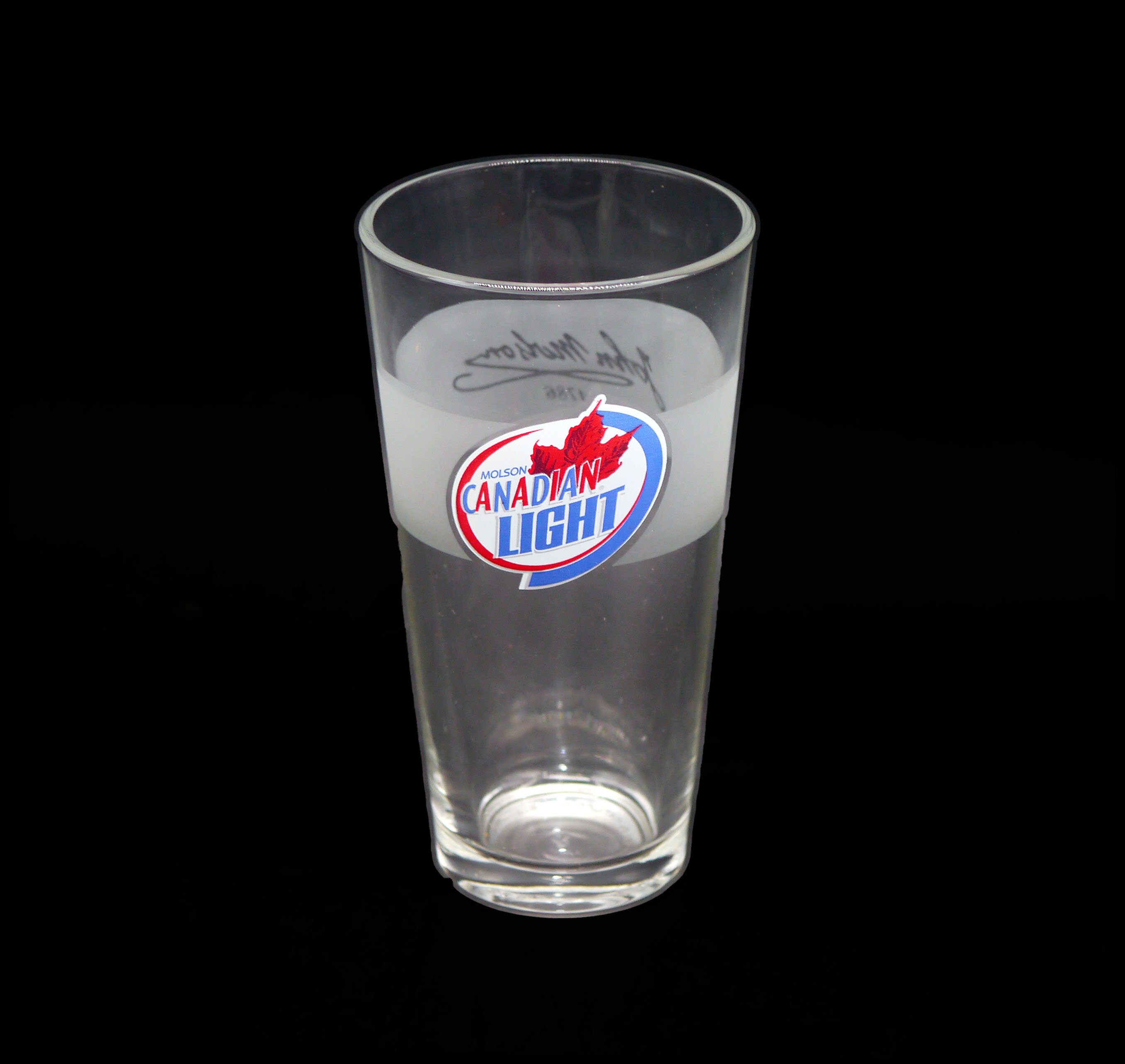 Molson Canadian Light pint glass. Etchedglass branding, frosted