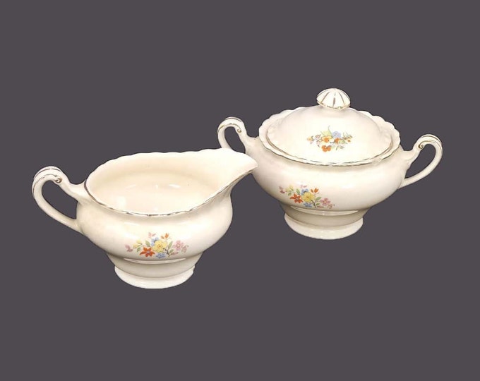 Antique Edwardian Age J&G Meakin MEK188 creamer and covered sugar bowl. Sol Marigold Ironstone made in England. Flaws (see below).