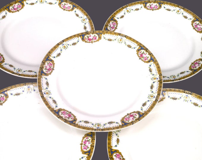 Five antique Tressemanes & Vogt TRV44 Limoges bread plates made in France.