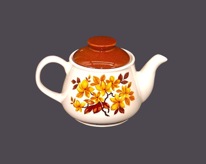 Sadler four-cup teapot. Fall | autumn-colored leaves, brown lid. Made in England.