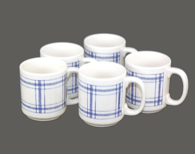 Five Eaton Home ceramic coffee or tea mugs. Blue-and-white checks.