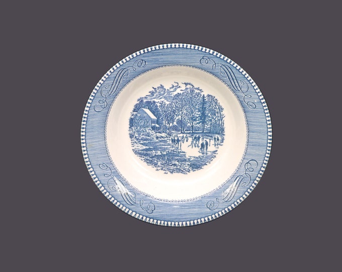 Royal China Currier & Ives Blue Early Winter rimmed soup bowl made in USA. Sold individually.