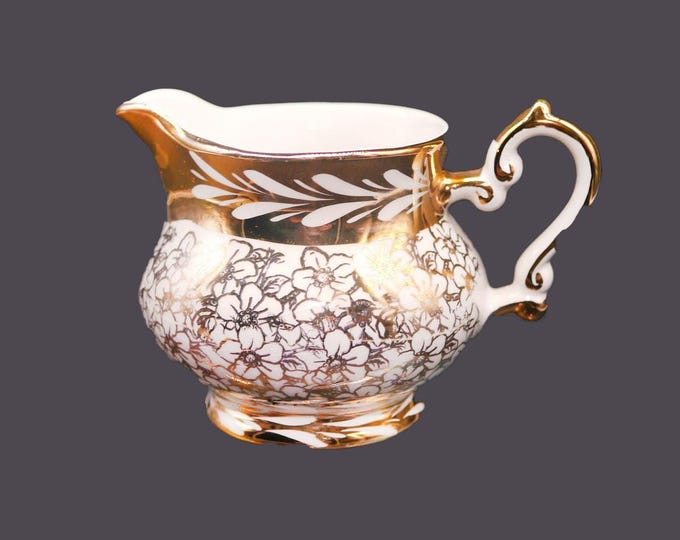Gibsons W989 hand-decorated, gold lusterware creamer jug made in England.