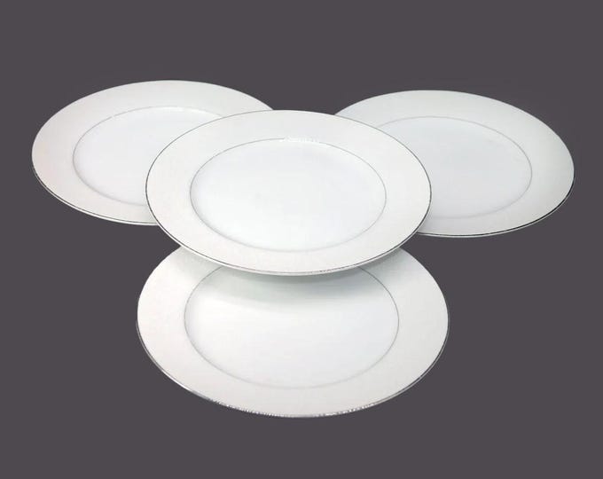 Four Royal Cameo Spanish Lace dinner plates made in Japan.