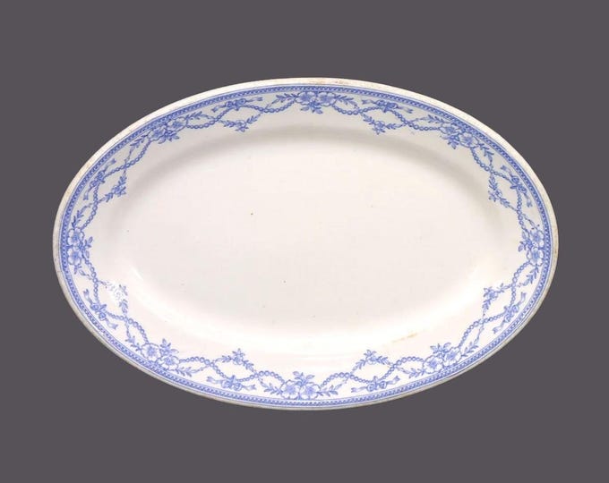 Antique late Victorian-era John Maddock & Sons Wild Rose blue-and-white oval steak or burger platter. Vitrified hotelware made in England.