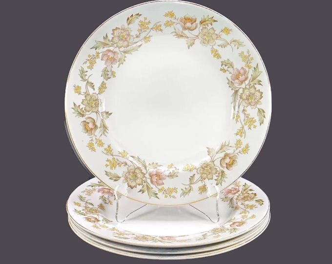 Four Johnson Brothers Washington dinner plates made in England.