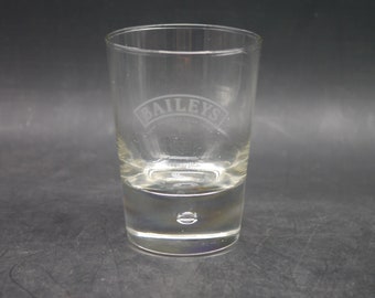 Baileys Irish Cream tulip-shaped, footed glass. Etched-glass frosted banner.