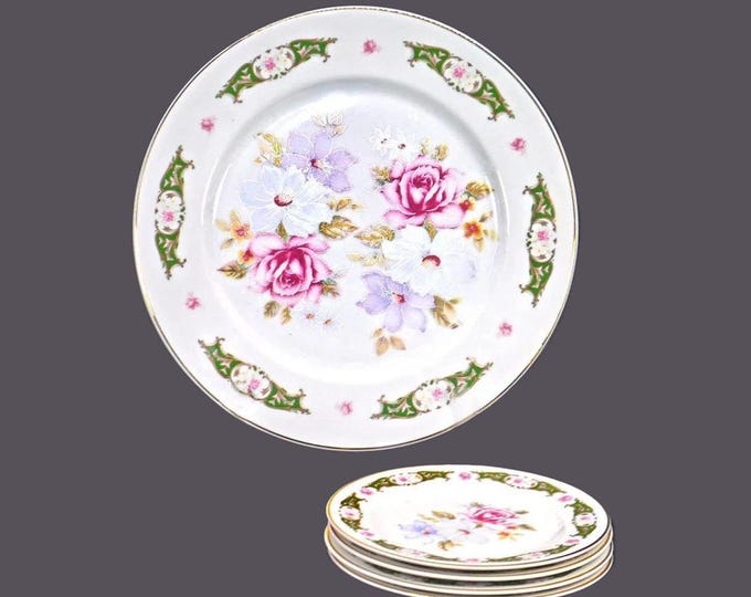T Limoges Porce Oeste dessert plate set. Large serving plate, four dessert plates. French Limoges decorated in Portugal.