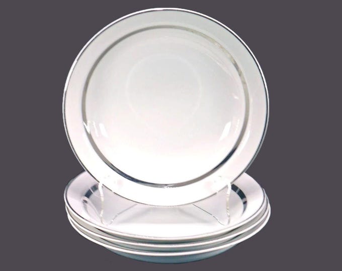 Four Harmony House Silver Rhapsody 3506 rimmed soup bowls made in Japan.