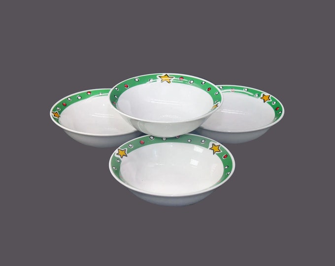 Four Gibson Designs Christmas Treasures coupe cereal bowls.