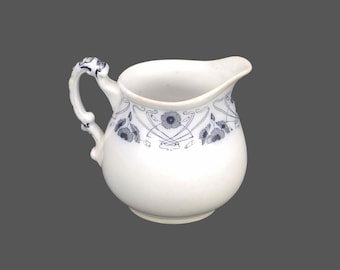 Antique Victorian era Keeling & Co Carnation blue-and-white creamer jug made in England.