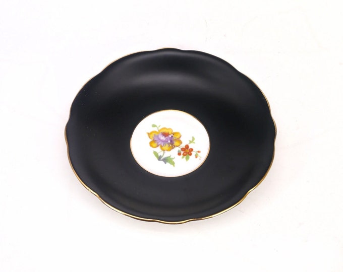 Gladstone China black, yellow, red, purple flowers orphaned saucer only. Bone china made in England.