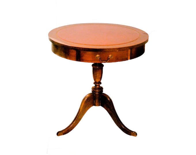 Beaucraft by Elmira solid wood round end table with top leather insert, Duncan Phyfe metal-capped feet, faux drawer. Made in Canada.