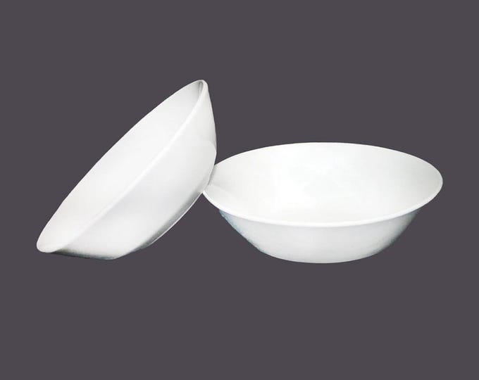 Pair of Johnson Brothers Tivoli coupe cereal bowls. Classic all-white ironstone made in England.