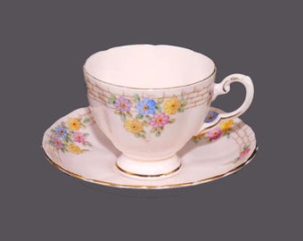 Vintage Tuscan China 7377 pink and gold bone china tea set made in England.