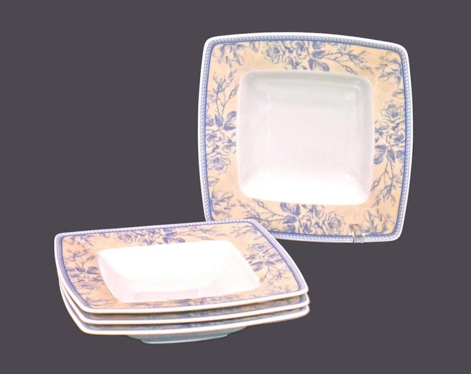 Four Lubiana blue and peachy yellow floral toile squared, rimmed soup bowls made in Poland.