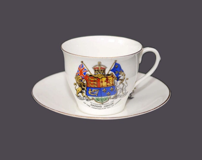 Almost antique Aynsley Diamond Jubilee of Canadian Confederation cup and saucer set. Canadiana made in England. Flaw (see below).