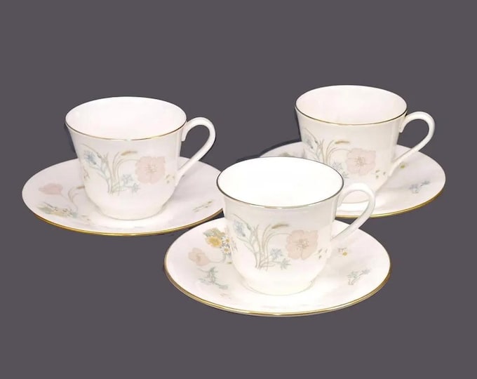 Three Royal Doulton Flirtation H5043 cup and saucer sets. Bone china made in England.