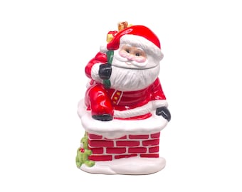 Frosty Santa Claus ceramic Christmas cookie jar.