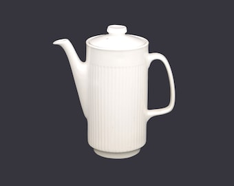 Johnson Brothers Athena six-cup teapot. All-white ironstone made in England. Flaw (see below).