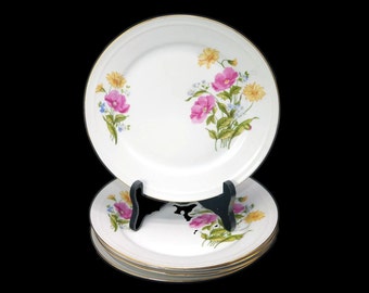 Five Freiberger Porzellan salad plates made in Germany. Multicolor florals.