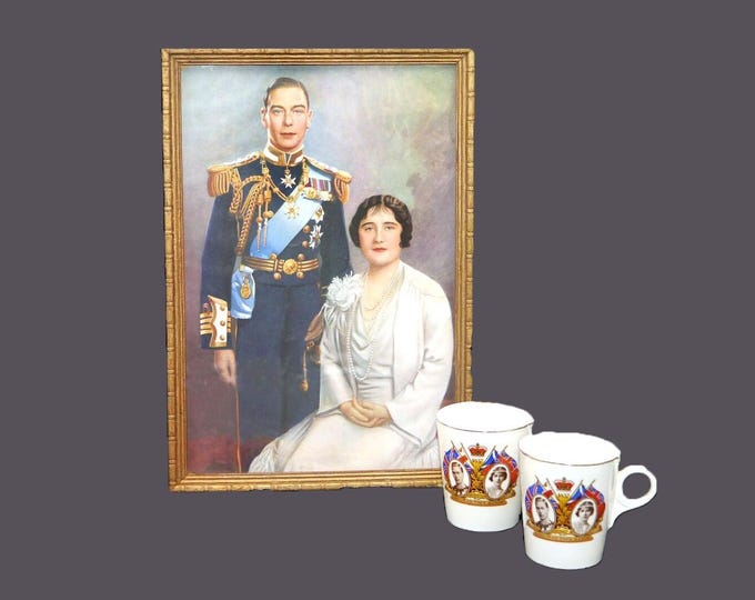 Royalty set. Framed color portrait of King George VI and Queen Elizabeth and two Coronation mugs. New Percival Furniture Co.