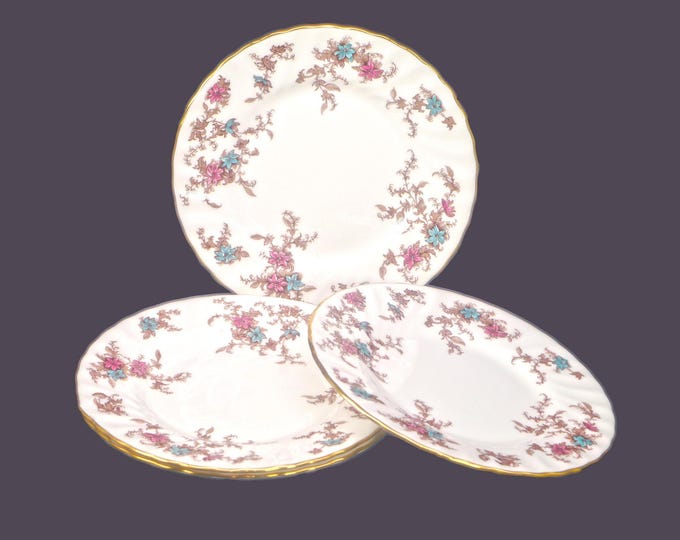 Four Minton Ancestral S376 bone china bread plates made in England.