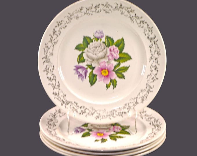 Five British Empire Ware Bouquet luncheon plates.