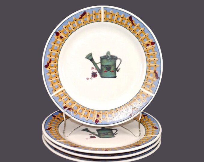 Four Sakura Picket Fence stoneware salad plates. Majesticware stoneware designed by Leslie Beck.