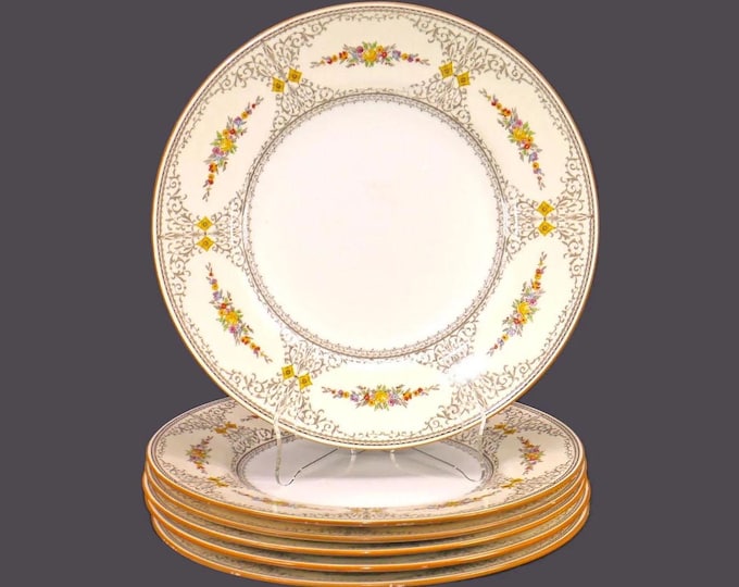 Six antique numbered Minton Sheridan B1227 dinner plates made in England. Flaws.