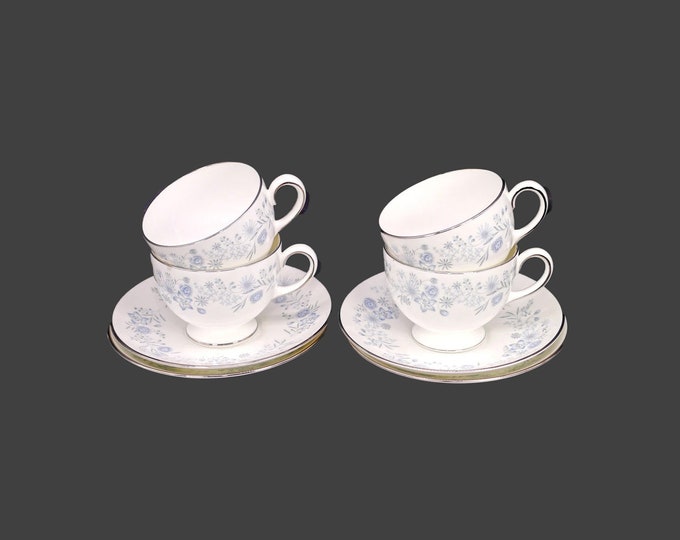 Four Wedgwood Belle Fleur R4356 bone china cup and saucer sets made in England.