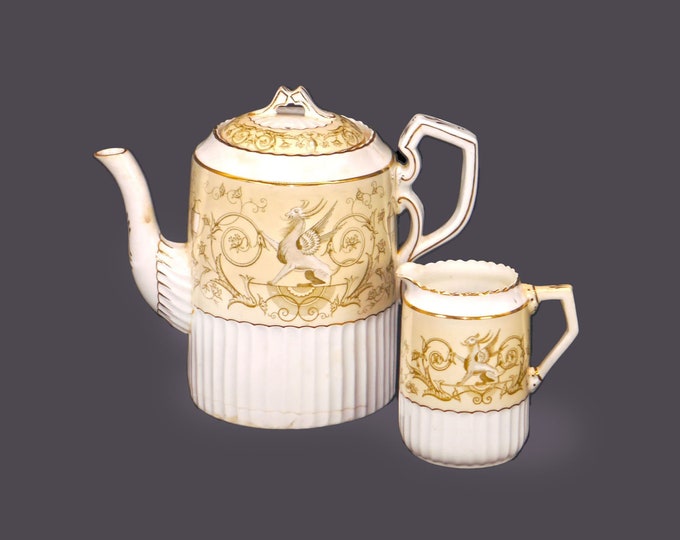 Antique later Victorian H.M. Williamson & Sons Griffin 79519 six-cup teapot with creamer. England. Very rare. Flaws.