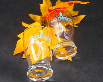 Pair of Silversmith Brewing beer sampling | beer tasting glasses. Etched-glass branding.
