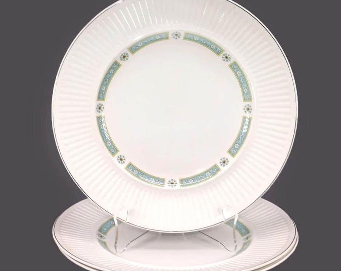 Three Johnson Brothers JB323 dinner plates made in England.