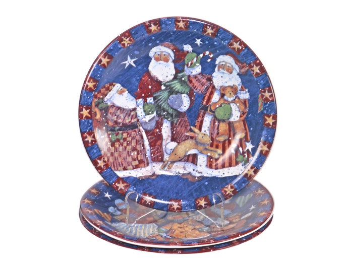 Three Certified International Christmas Magic salad plates. Susan Winget design.